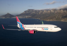 A FlySafair aircraft in flight. The airline confirmed that one of its aircraft was held at King Phalo Airport on Wednesday, 21 October 2026, following a reported bomb threat. Photograph: FlySafair
